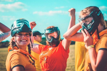 The archery battles taking place at Camp Wildfire. A summer weekend break in a forest near London and Kent. An outdoor woodland retreat featuring adventure activities, live music, DJs, parties and camping. Half summer adventure activity camp, half music festival, for adults only.