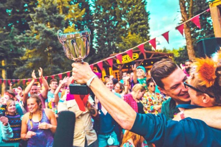 Close up of the Camp Wildfire trophy. A summer weekend break in a forest near London and Kent. An outdoor woodland retreat featuring adventure activities, live music, DJs, parties and camping. Half summer adventure activity camp, half music festival, for adults only.