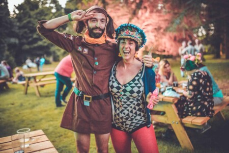 Brownie style fancy dress at Camp Wildfire. A summer weekend break in a forest near London and Kent. An outdoor woodland retreat featuring adventure activities, live music, DJs, parties and camping. Half summer adventure activity camp, half music festival, for adults only.